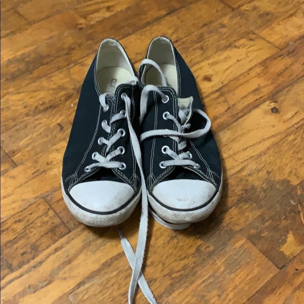 Women’s worn black converse